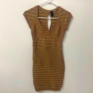 Marciano dress size S in gold. Bandage. Worn a few times.